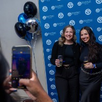 Two girls getting their picture taken